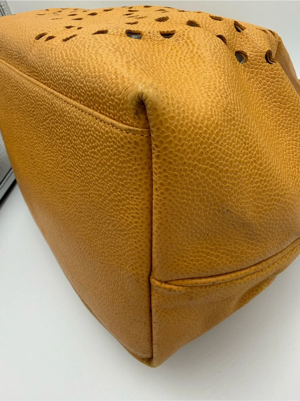 Chanel Perforated Drawstring Bucket Bag in Caviar Leather